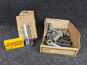 lot 1626 image: Lot of Vintage Suzuki Tools, Clutch Alignment Tools, Front Fork Pressure Gauges and More