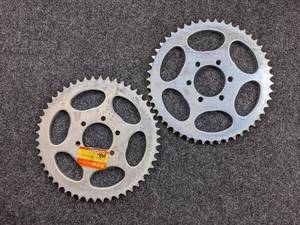 lot 1675 image: NOS - (Lot of 2) 1977-83 Suzuki GS400, GS425, GS450  Rear Chain Sprockets - Part No. 64511-44000