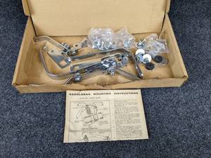 lot 1683 image: NOS - Saddlebag Bracket Kit for Suzuki GS750 - Unsure if complete - please inspect