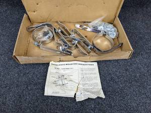lot 1682 image: NOS - Saddlebag Bracket Kit for Suzuki GT550 - Unsure if complete - please inspect
