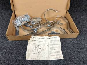 lot 1680 image: NOS - Saddlebag Bracket Kit for Suzuki GT550 - Unsure if complete - please inspect