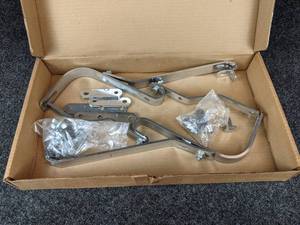 lot 1679 image: NOS - Saddlebag Bracket Kit for Suzuki T500 - Unsure if complete - please inspect