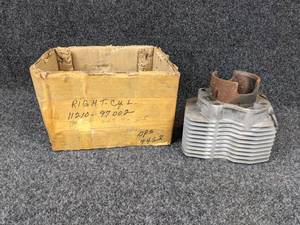 lot 1637 image: Suzuki Snowmobile Cylinder Head - Part No. 11210-97002 - Box says Bored .05