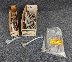 lot 1669 image: Large Lot of NOS and USED Vintage Suzuki Brake Levers