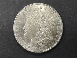 lot 12 image: 1921 Morgan Silver Dollar...