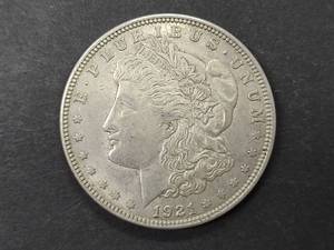 lot 13 image: 1921 Morgan Silver Dollar...