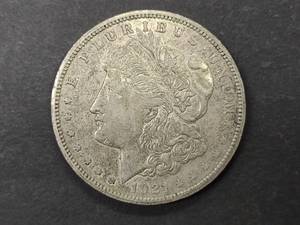 lot 18 image: 1921 S Morgan Silver Dollar...