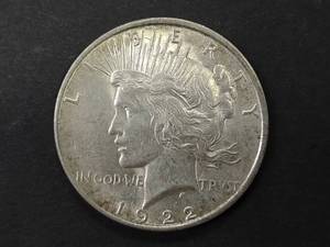 lot 22 image: 1922 D Peace Silver Dollar...