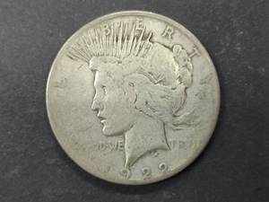 lot 25 image: 1922 S Peace Silver Dollar...