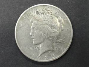 lot 33 image: 1925 Peace Silver Dollar...