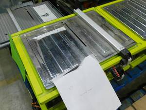 lot 58 image: RYOBI 7 in. 4.8 Amp Tabletop Tile Saw