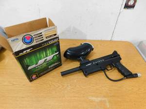 lot 16 image: JT Raider Paintball Gun & Partial Box of Paintballs