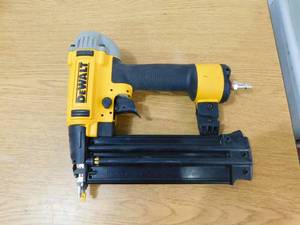 lot 101 image: DEWALT 18-Gauge Pneumatic Corded Brad Nailer