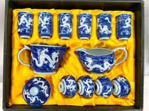 lot 35 image: Vintage Asian Blue & White Dragon Tea Set with Teapot, Server and 10 Cups