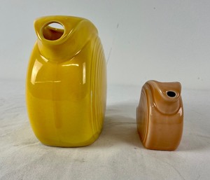 lot 159 image: Fiestaware Yellow Disk Pitcher & Mini Peach Disk Pitcher