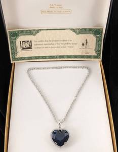 lot 92 image: Titanic The Heart of the OceanPendant Necklace - J. Peterman Legal Replica, COA
