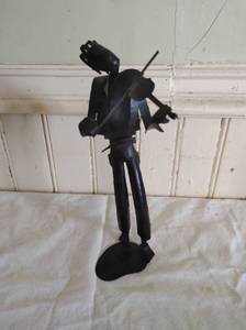 lot 13 image: Metal Fiddler Figure