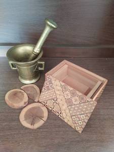 lot 93 image: Brass Mortar and Pestle and Wood Box with Coasters