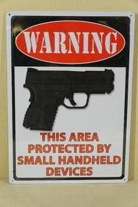 Tin Sign - This Area Protected by Small Handheld Devices