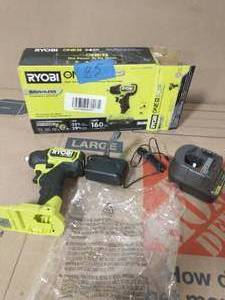 lot 25 image: RYOBI ONE HP 18V Brushless Cordless Compact 38 in. Impact Wrench Kit 18V Charger