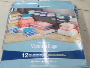 lot 66 image: whitmore space saver vacuum bags ope...