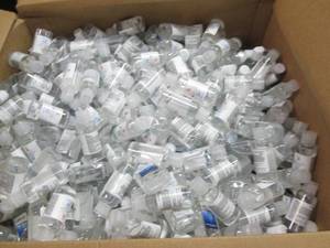 lot 88 image: box full of small bottles of hand s...