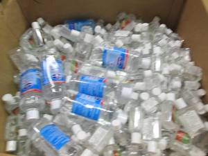 lot 89 image: box full of small bottles of hand s...