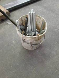 lot 250 image: pail of shelf brackets ...