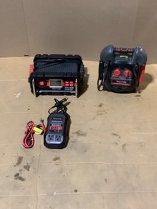 lot 24 image: Vector 12-Volt Automotive Portable Car Battery Charger, 700-Peak Amp Portable Car Jump Starter & 500-Watt Portable Inverter. See Pictures