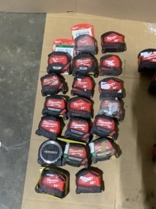 lot 33 image: Assorted Sizes of Milwaukee Measuring Tapes. Various Kinds & Condiitons. See Pictures