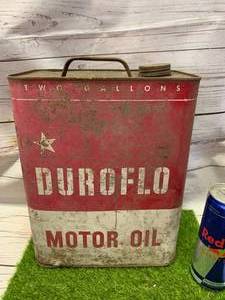 lot 44 image: Dura Flow Motor Oil 2 Gallon Metal Can