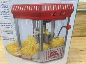 lot 110 image: NOSTALGIA Vintage Collection 2.5 oz. Red Kettle Countertop Popcorn Machine