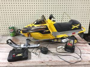 lot 52 image: New Bright RC Skidoo Mxz Snowmobile