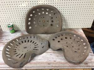 lot 99 image: 3 Antique Tractor Seats