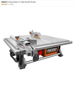 lot 17 image: RIDGID 6.5 Amp Corded 7 in. Table Top Wet Tile Saw. See Pictures