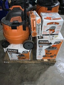 lot 54 image: Pallet of Assorted RIGID Shop Vacuums, Filters, Water Pumps & Angle Grinder. Various Conditions. See Pictures