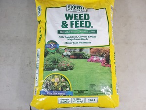 lot 36 image: New 39 lb Bag of Yard Weed and Feed - High Dollar Stuff