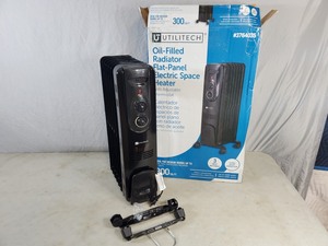 lot 144 image: New Oil Filled 1500 Watt Space Heater