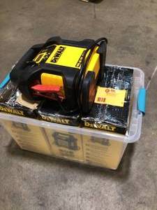 lot 1 image: Lot of 4 Assorted 1400 Peak Amp Portable Car Jump Starter with Digital Compressor by DEWALT Not Reused Customer Returns See Pictures