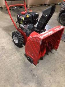 lot 6 image: Storm 24 in. 208 cc Two- Stage Gas Snow Blower with Electric Start Self Propelled by Troy-Bilt Customer Returns See Pictures