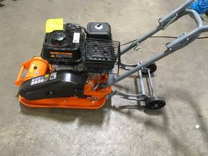 lot 40 image: Yardmax 2500lb Compaction Force Plate Compactor in like new condition