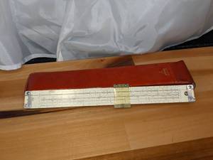 lot 43 image: Vintage Pickett Slide Rule wLeather Case
