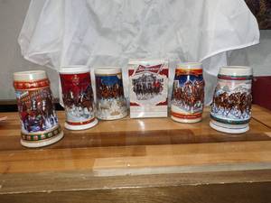 lot 42 image: Collection of 6 Budweiser Holiday Steins