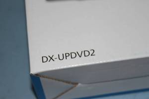 lot 79 image: New in Box Lot of Two (2) Dynex DVD Players with HD Upconversion - Model DX-UPDVD2