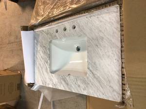 36 in. White wash Vanity with White Marble Top with White Basin retails for $1053 not used see pictures