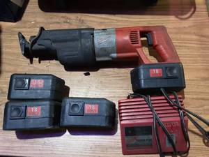 lot 5 image: Milwaukee 18 Volt Cordless Sawzall, 4 Batteries & Charger