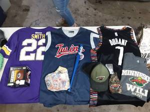 lot 28 image: Lot Of Sports Jerseys & Gift Wares