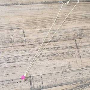 lot 63 image: 18 Chain 14K With Red Stone Charm 10K