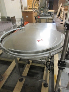 lot 505 image: POWERED, DISC STYLE,  ACCUMULATING TABLE