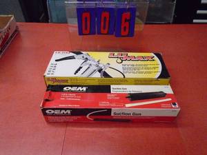 New grease gun & oil suction kit. As shown.